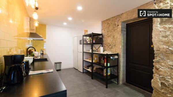 Acogedor estudio sobre jardín con baño en Gracia Co-living